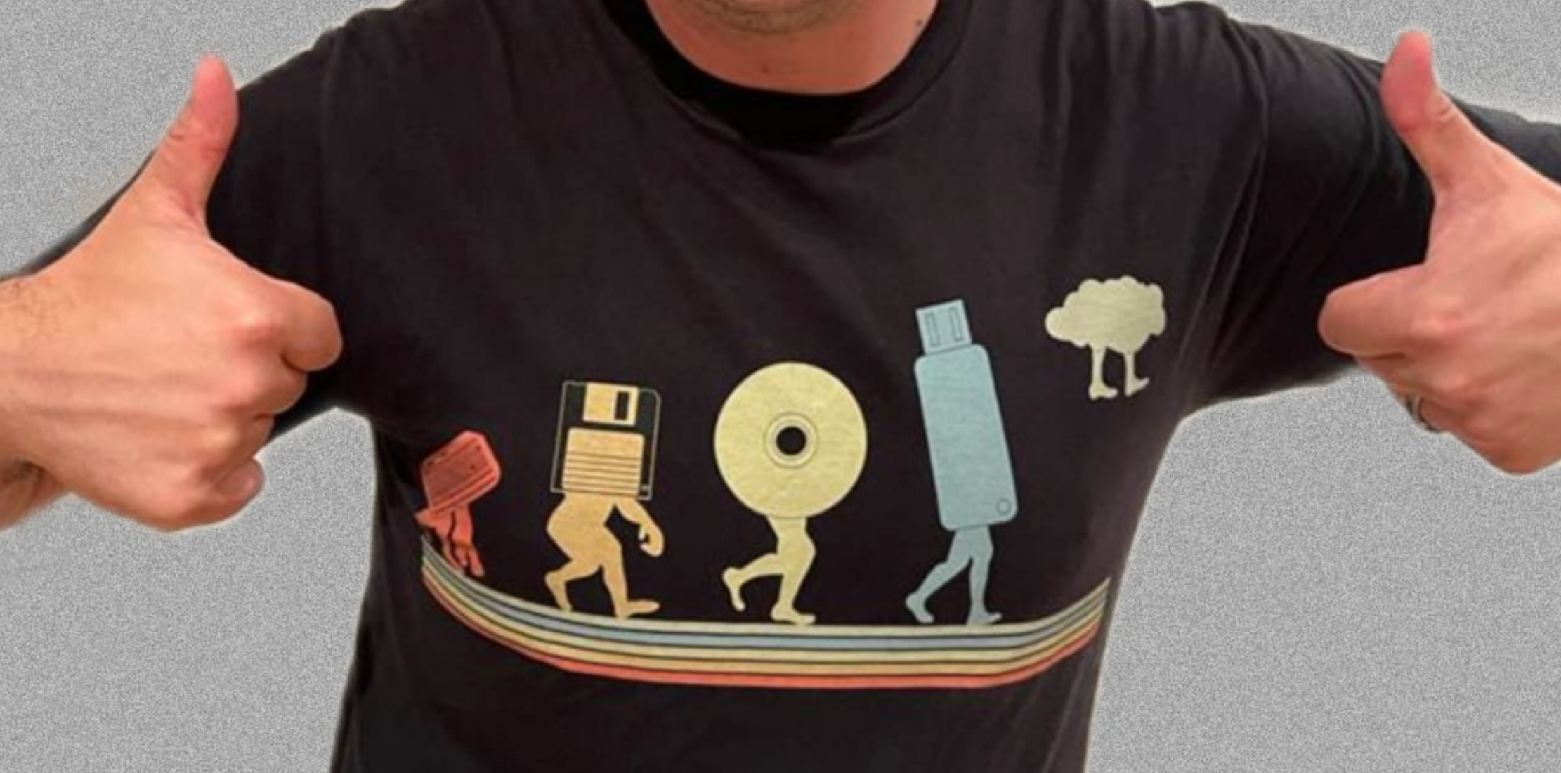 T-shirt design showing the evolution of storage: cassette, floppy disk, CD, USB stick, then the cloud