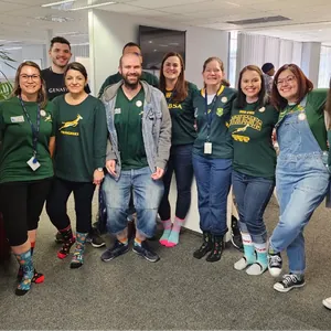 A group of colleagues in Springbok shirts