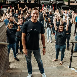 Colleagues cheering on a set of steps
